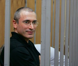 Mikhail khodorkovsky former boss of yukos oil company before the start of the court hearing, khodorkovsky and and his business partner, main yukos shareholder platon lebedev are charged with fraud and...