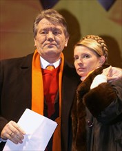 Ukraine election crisis 2004, opposition presidential candidate viktor yushchenko (left) and his companion yulia timoshenko called on the participants in a rally to assault the presidential administra...