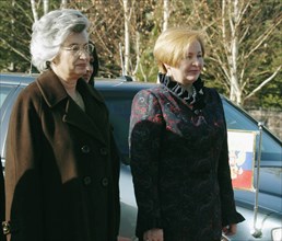 Turkish president's wife senry sezer (l) and russian first lady lyudmila putin (r) at the official ceremony during  russian-turkish summit in ankara, turkey, december 12, 2004.