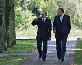 Turkish prime minister recep erdogan (right) and russian president vladimir putin seen during a stroll in 'bocharov ruchei' presidential residence prior to their news conference on july 18, 2005, soch...