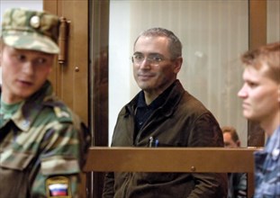 Former head of yukos mikhail khodorkovsky leaving the courtroom after hearing that the moscow city court has reduced his and p, lebedev's sentences from 9 to 8 years of imprisonment, moscow, russia, s...
