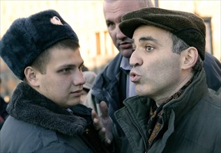 Garry kasparov (right), leader of the united civil front, is pictured at the “protest march of those who disagree” at the stone from solovki (a monument to the victims of gulag) in lubyanka square (wh...