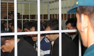 Tashkent, uzbekistan, rebels involved in mass disturbances in andizhan in may, 2005 appear in the supreme court of uzbekistan, the court found them guilty of terrorism, an attempted coup d'etat and un...