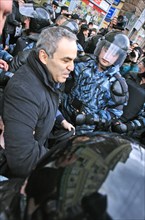 Omon officers detain united civil front leader garry kasparov during the 'march of those who disagree' in central moscow, april 15, 2007.