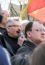 Leader of the national bolshevik party (nbp) eduard limonov speaks into microphone during the 'march of those who disagree' in st, petersburg, april 15, 2007, st, petersburg, russia.