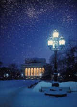 The pushkin drama theater in st, petersburg during a snow storm at night, 1990s.