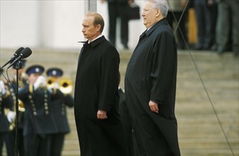 Russian president vladimir putin in cathedral square with former president boris yeltsin after his inauguration on may 7, 2000.