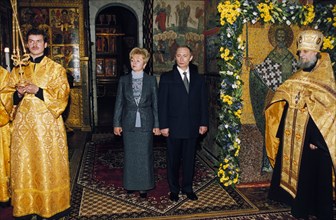 Vladimir putin with his wife, lyudmila, at the annunciation cathedral in the moscow kremlin during his inaugeration ceremonies, moscow, russia, 2000.