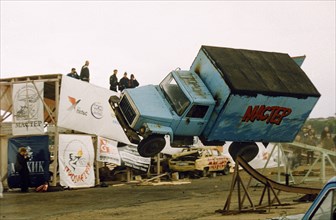 A truck going off a ramp at the 4th international stunt driving festival in khodynskoye field, moscow, may 2001.