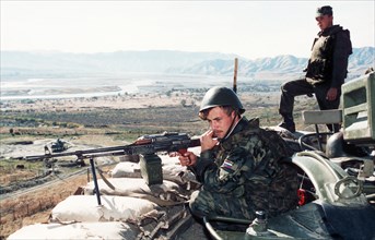Servicemen of the 201st division stationed near the tajik-afghan border to provide back-up for russian and tajik frontierguards, dec, 2001.