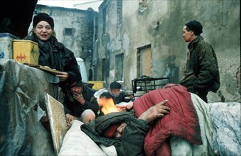Moscow, russia, 2002, nearly 300 bomzhes (homeless people) have died since the start of the winter: a bomzhe commune in moscow yard.