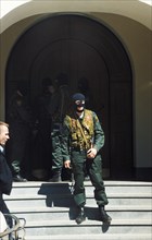 Moscow, russia, may 11, 2000, masked tax police officers during searches of the offices of the media-most holding company, may 31, 2000, moscow, russia, the searches are part of the investigation of v...