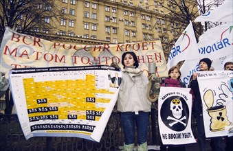 An anti-nuclear demonstration outside the russian federation ministry of nuclear energy in november of 2002, the people are protesting the importing of spent nuclear fuel and radioactive waste from bu...