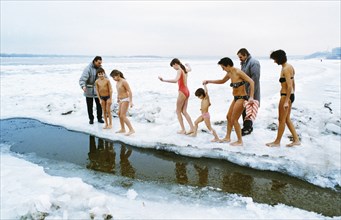 Porfiry ivanov's body hardening system: enthusiasts training on the frozen volga river, january 1996.