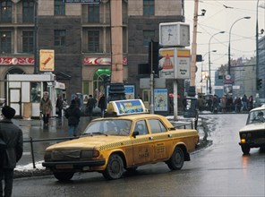 A taxi on tverskaya street, moscow, january 1996.
