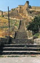 Stairs leading up to narym kala fortress (beautiful fortress) in the ancient city of derbent, dagestan.