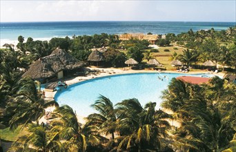A swimming pool on the grounds of a resort hotel on varadero beach in cuba.