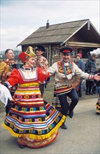 Ryabinushka folk ensemble performing at an easter folk festival at kolomenskoye in the moscow region.