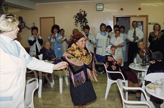 Antonina savelova celebrating her 100th birthday at a nursing home in moscow, russia, april 1998.