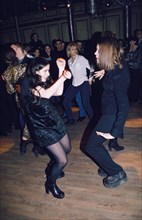 Young muscovites dancing at the 16 tons disco in moscow, russia, 1998.