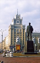 Mayakovsky square, moscow, russia, monument to writer mayakovsky with the peking hotel in the background.