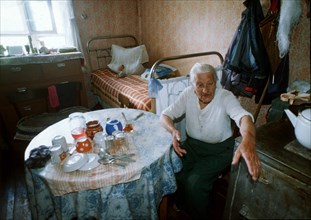 Nazia, russia, petersburg region, 1998, families are leaving the area due to the collapsed economy.