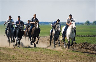 Traditional horse racing during sabantuy, the main tatar national holiday, tatarstan, russia.