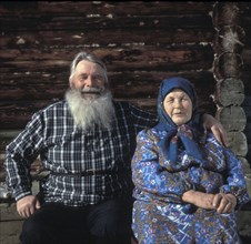 The popovs are elderly farmers from siberia, 1990s.