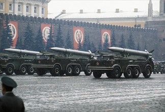 Mobile rocket launchers carrying frog-7 surface-to-surface unguided short range tactical missiles (capable of being armed with nuclear warheads) during a military parade, celebrating the 54th annivers...