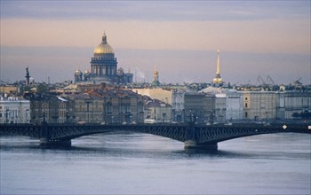 Bridge crossing the neva river in st, petersburg, russia, the dome of st, isaac's cathedral is in the background, 2003.