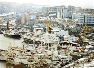 Cruise ships and fishing vessels in the port of vladivostok in russia.