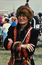 A yakut man, dmitri popov - winner of the national costume contest, at the yakut folk festival, 'ysyakh', siberia 1990s.