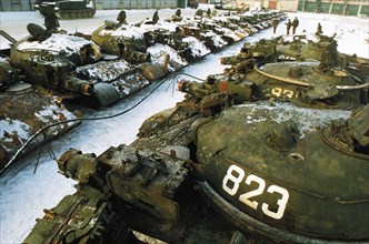 Soviet tanks gathered outside st, petersburg's tank repair works where they will be dismantled in accordance with the treaty on reduction of conventional armaments in europe, march 1993.