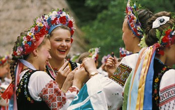 Young women who are part of a ukrainian folk troup at an annual folk festival, ukraine.