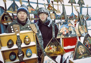 Folk crafts for sale at the outdoor market at izmailovo park, moscow, 1990s.