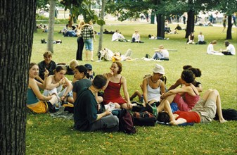 Young muscovites enjoying the summer weather in alexander garden near the kremlin wall, 2000s.