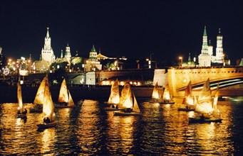 A yacht show on the moskva river during the day of the city celebration in moscow, russia, september 2001.