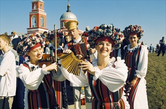 Members of the byelorussian folk troup, 'good evening', performing at the 3rd international slavic culture festival named 'khotmyzhsk autumn' held in the borisov region near belgorod, 2001.