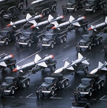 Trucks bearing sa-1 and sa-2 surface -to-air missiles lining up for a military parade in red square celebrating the 65th anniversary of the great october socialist revolution, november 7, 1982, moscow...
