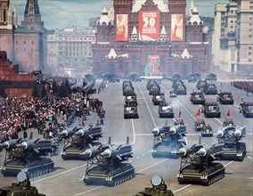 Motorized missile launchers with lyulev 2k11 'krug' (nato designation: sa-4 ganef) surface-to-air missiles at a military parade in red square on november 7, 1967, moscow, ussr.