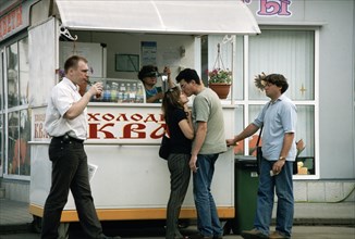 A kvass (traditional russian soft drink) stand in moscow, august 2003.