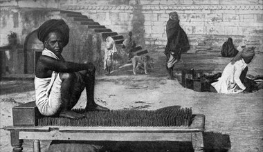 Historical Geography. 1900. India. Hardy ascetic at Benares piously indifferent to a couch of nails.