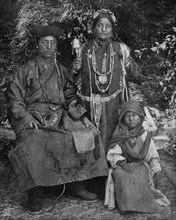 Historical Geography. 1900. India. Indian family  of Sikkim dressed up for the making of their portrait