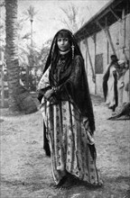 Historical Geography. 1900. Iraq. Lady of Iraq. Dark eyes and bright robes of Araby