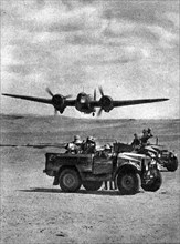 WWII World War II, the war in North Africa airplanes and armored vehicles in the desert