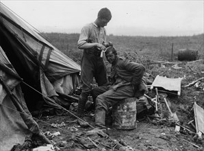 Dressing the wounds of a German prisoner.