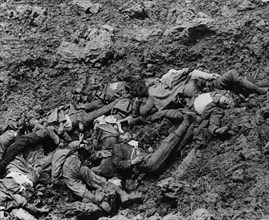 Somme German dead in shell hole.