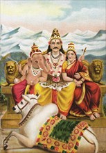 Lord Shankar (Shiva) with his son Ganesh and wife Parvati with his vehicle Nandi or the sacred Bull on Mount Kailash in the Himalayas