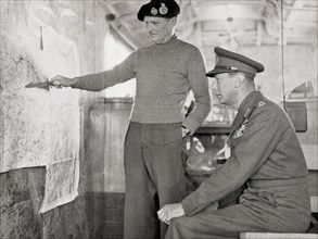 King George VI in the map lorry at Field-Marshal Montgomery's H