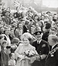 King George VI and Queen Elizabeth on their victory tour of London at the end of WWII in 1945